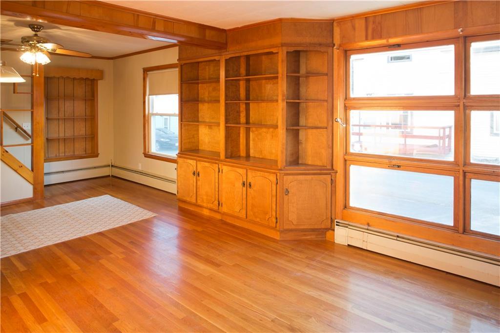 15 Call Road Milford, ME 04461 - Photo 4 of 27 Gleamiing hardwood floors & built in...