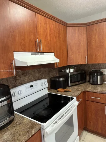 a view of swimming pool with a yard