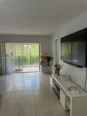 a room with a table and chairs