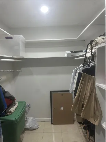 a view of room with air conditioner and air hockey table