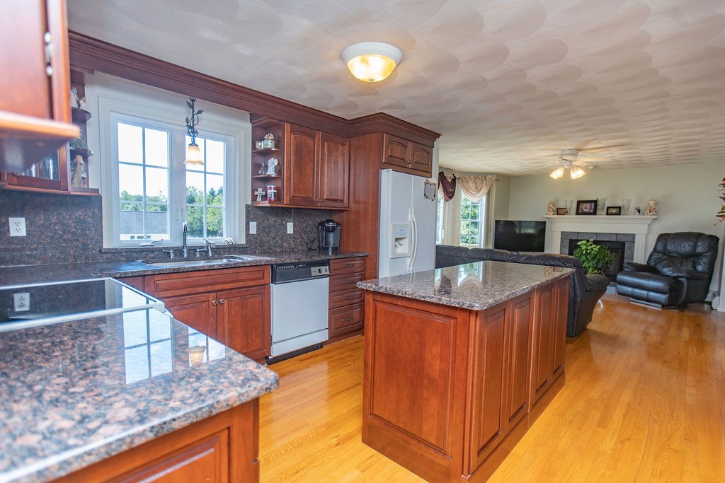 Gorgeous Custom Kitchen Open to Fireplaced Family Room~