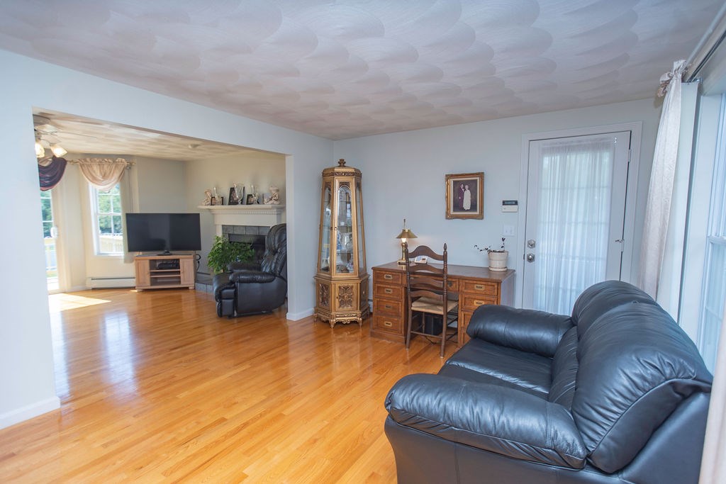 590 Seven Mile Road Scituate, RI 02831 - Photo 8 of 18 Formal Living Room Leading to Family Room~
