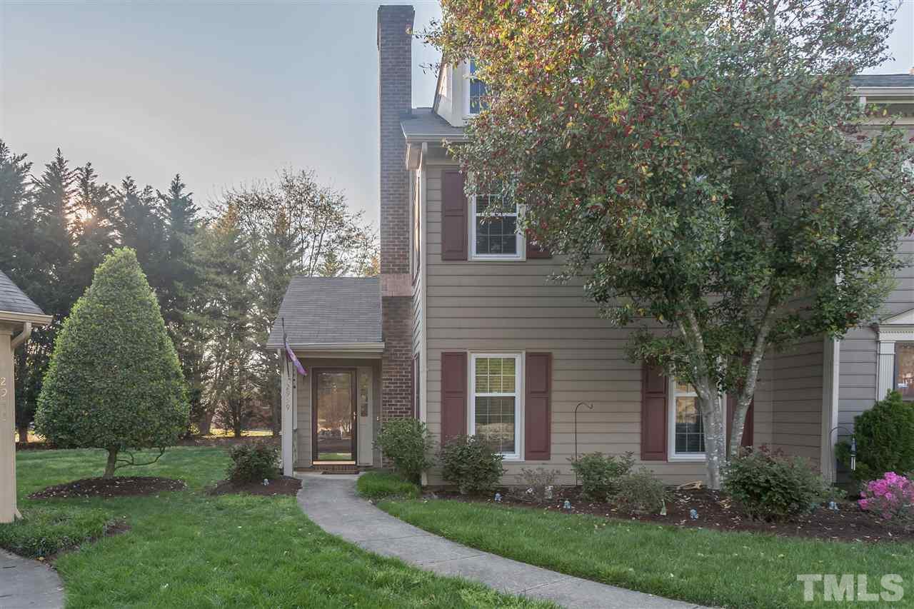 2959 Faversham Place Raleigh, NC 27604 - Photo 1 of 23 a front view of a house with garden and trees