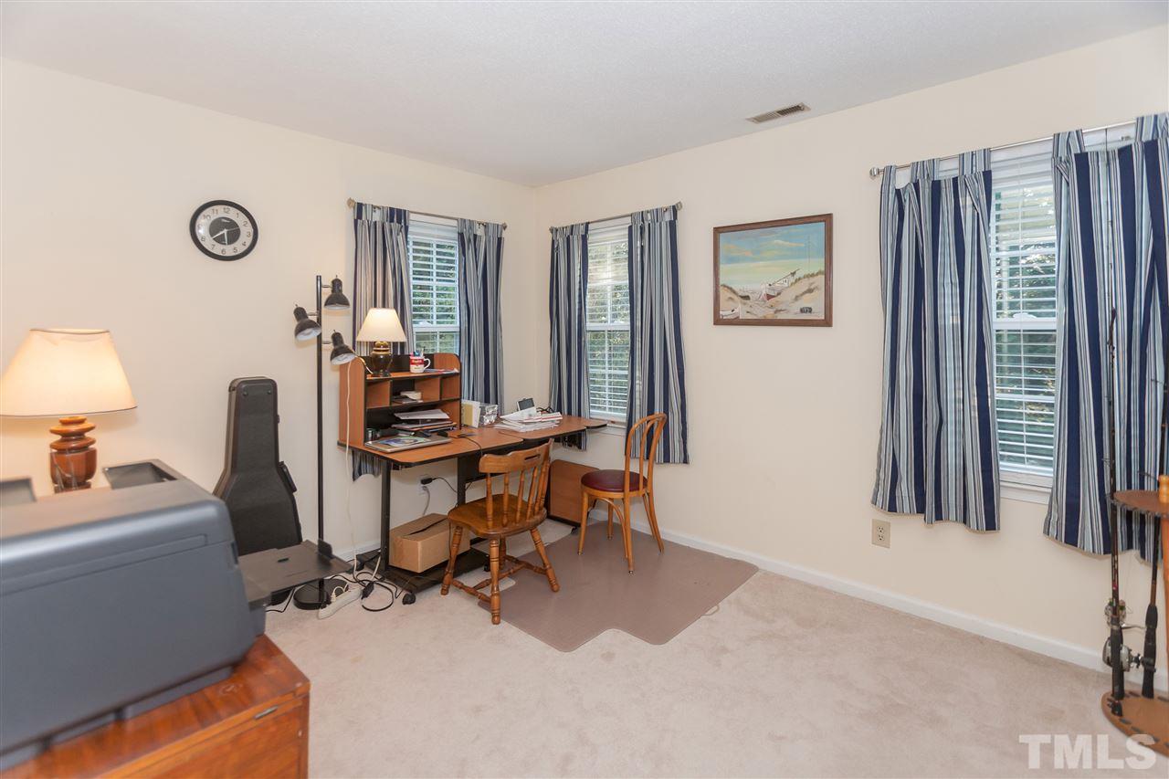 2959 Faversham Place Raleigh, NC 27604 - Photo 19 of 23 a view of a workspace with furniture and a window