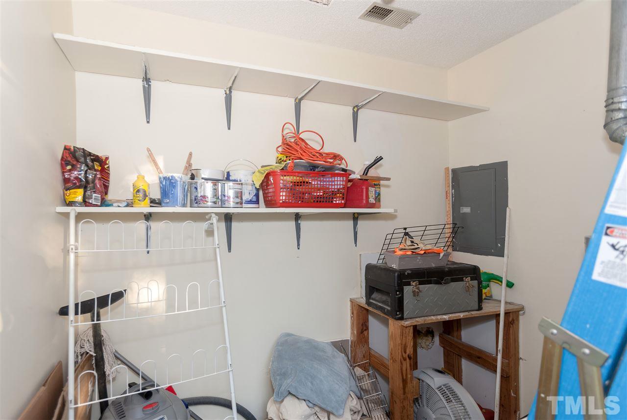 2959 Faversham Place Raleigh, NC 27604 - Photo 23 of 23 a room with a table and a chair