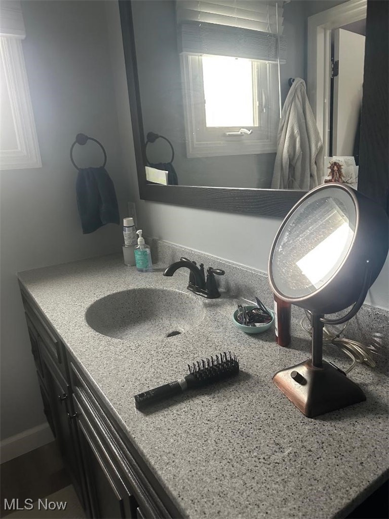112 Stratford Road Painesville, OH 44077 - Photo 9 of 12 Bathroom featuring vanity