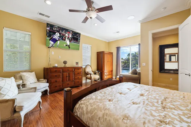 a bed room with bed and window