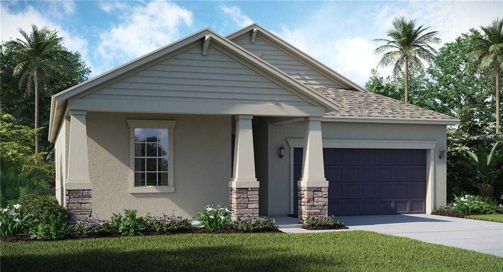1338 Montgomery Bell Road Wesley Chapel, FL 33543 - Photo 1 of 1 a front view of a house with a garden and yard