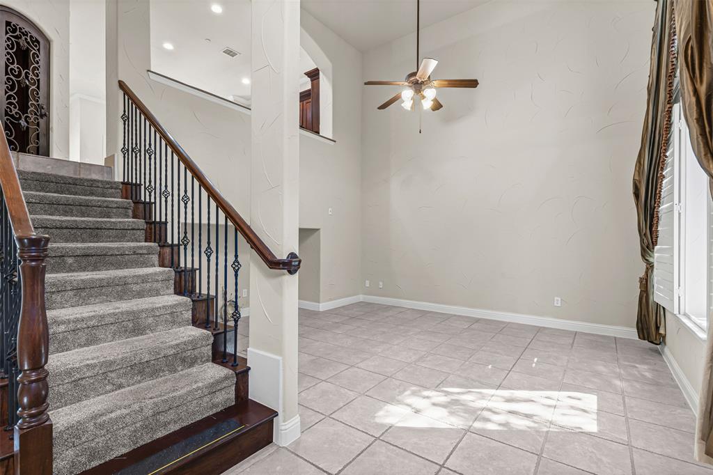 5717 Lunsford Road Plano, TX 75024 - Photo 3 of 25 a view of entryway and hall with wooden floor