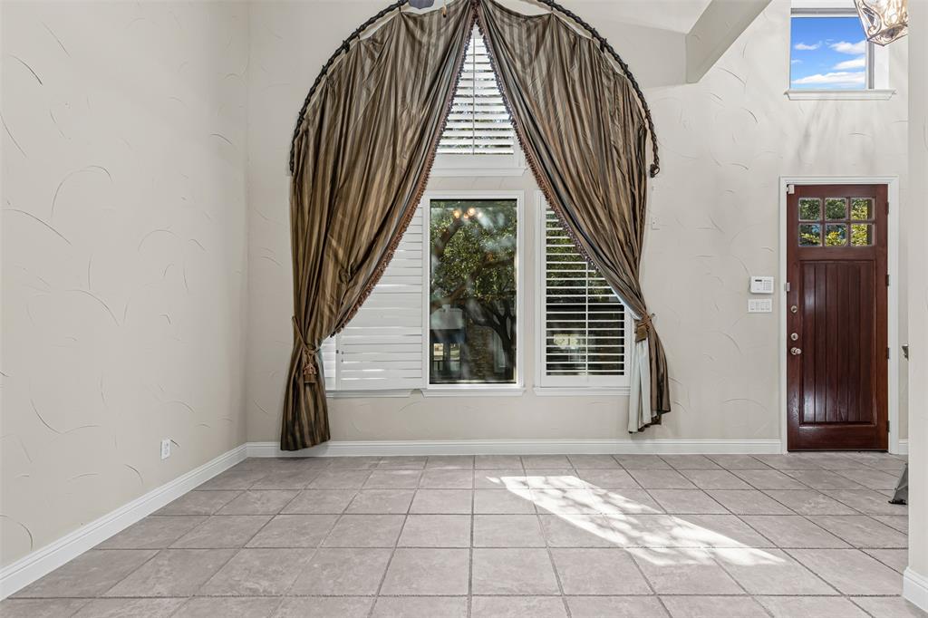 5717 Lunsford Road Plano, TX 75024 - Photo 6 of 25 a view of entryway with a front door