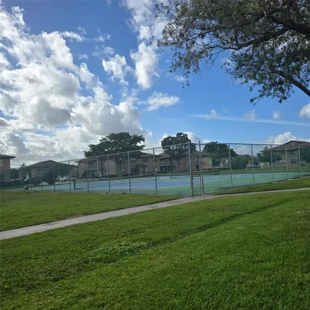 a view of a golf course of a park