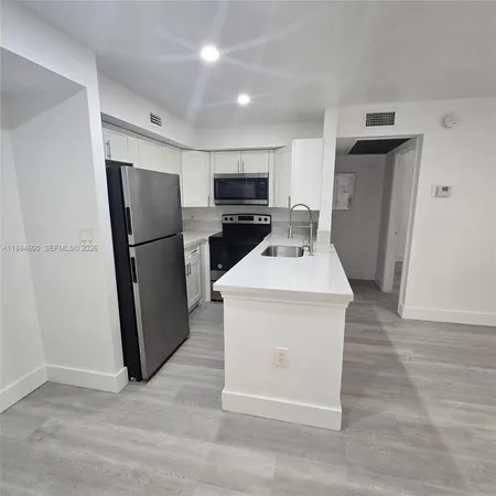 a utility room with washer and dryer
