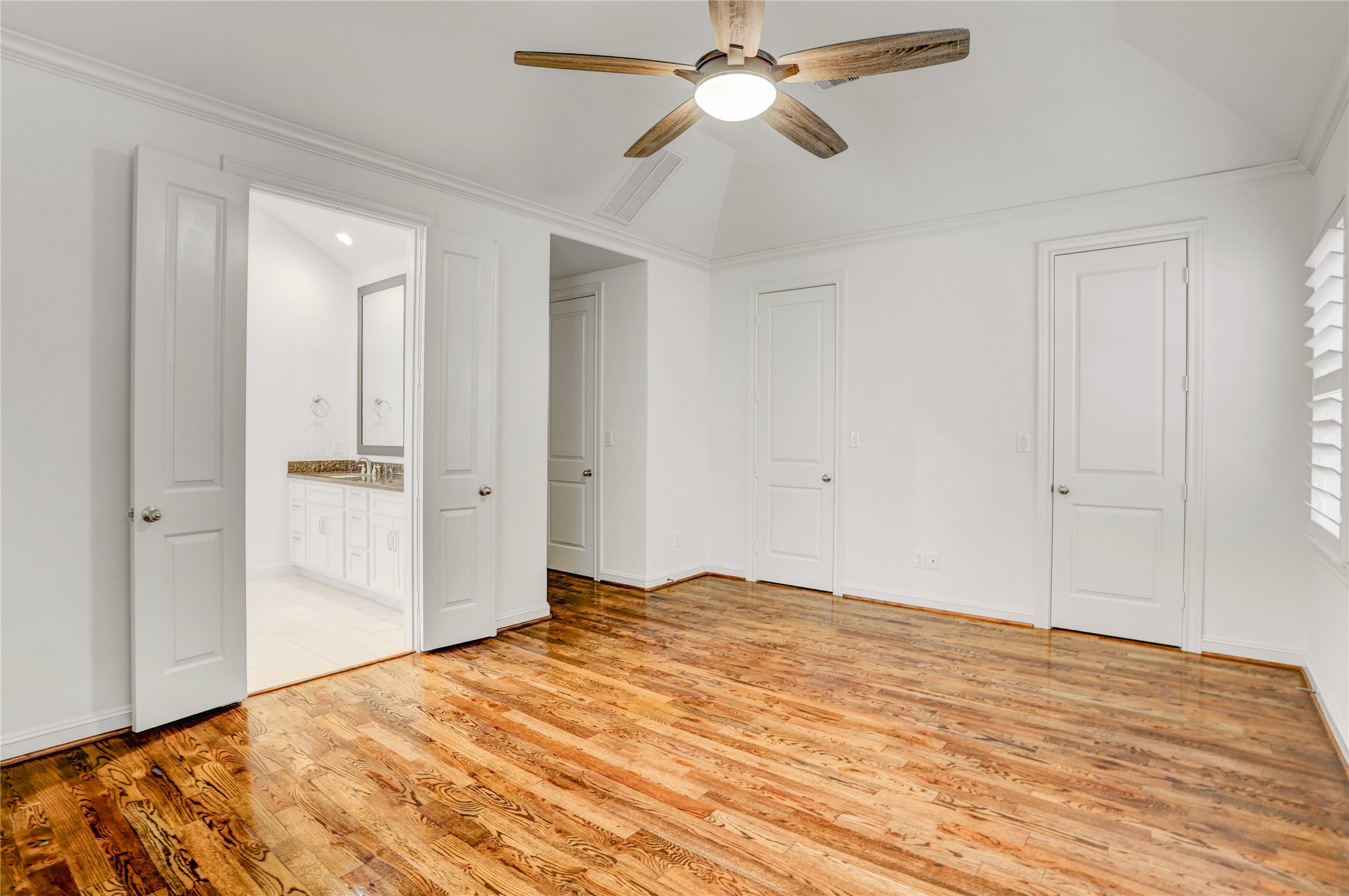 3225 Maxroy Street Houston, TX 77008 - Photo 17 of 30 Primary bedroom boasts four spacious closets—yes, four! Three of them are featured in this photo.