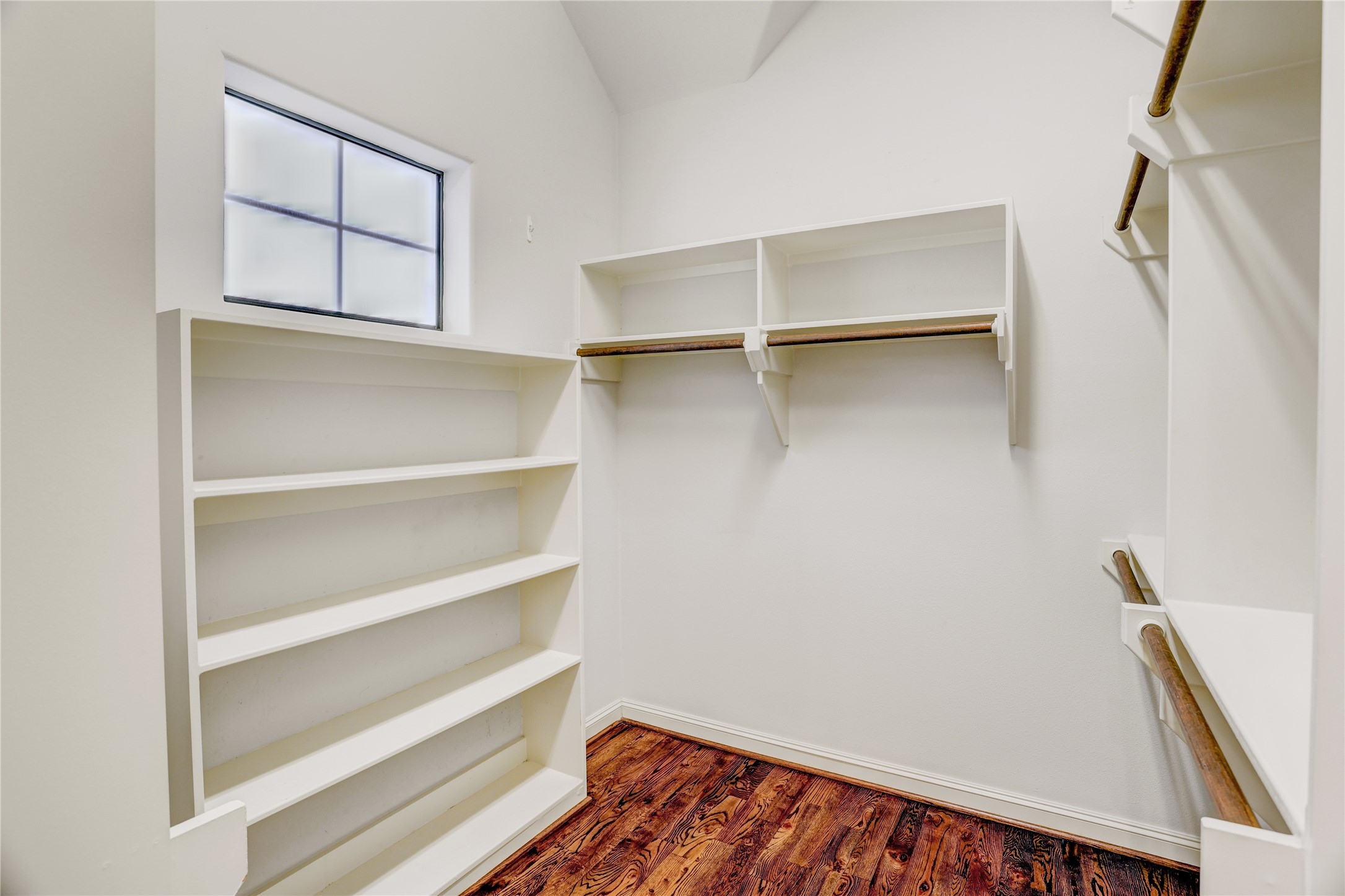 3225 Maxroy Street Houston, TX 77008 - Photo 20 of 30 The fourth primary closet features plenty of built-ins for organized storage.