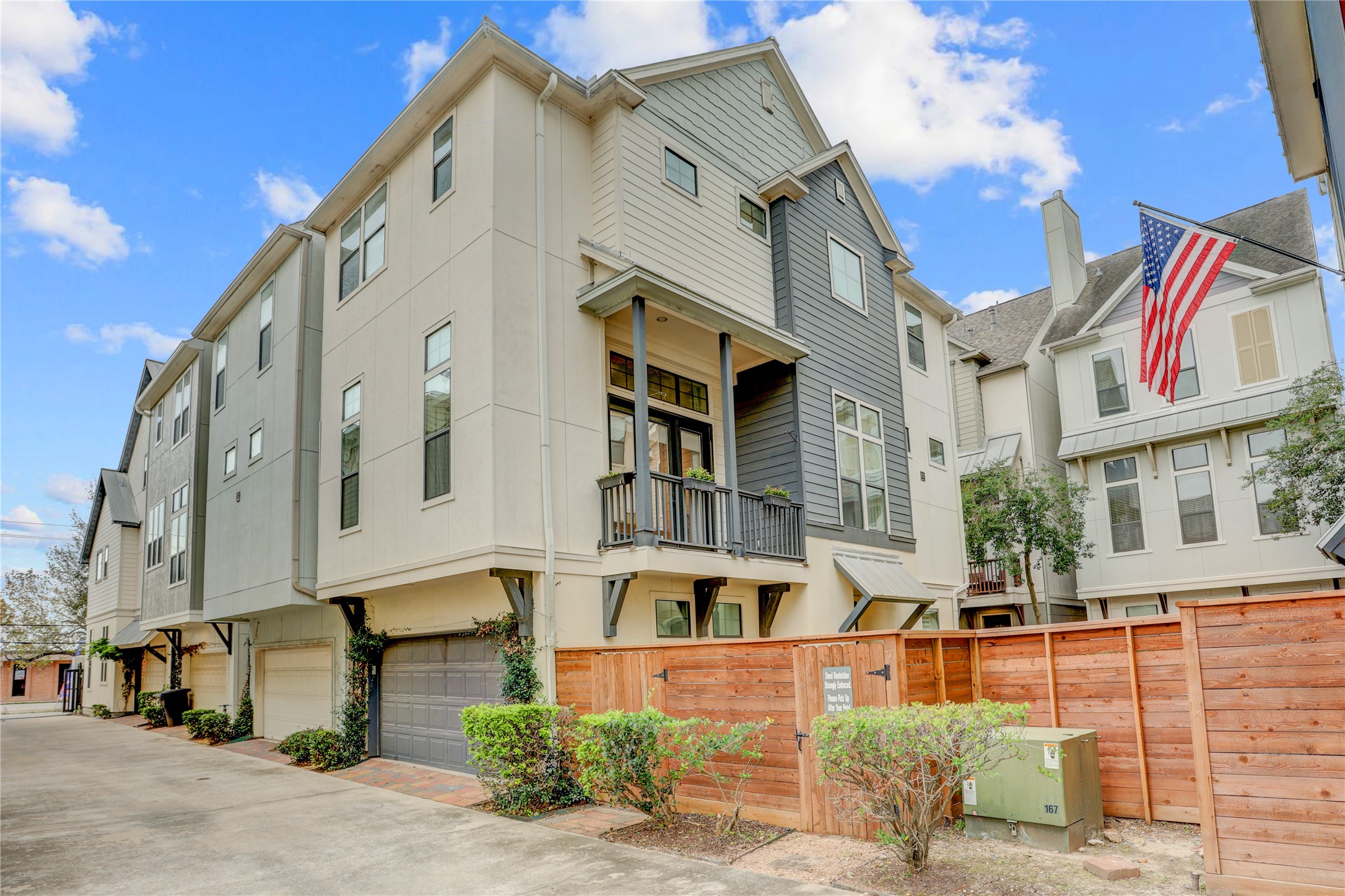 3225 Maxroy Street Houston, TX 77008 - Photo 2 of 30 Maxroy sits on a coveted end lot within a gated community, offering a larger yard and abundant natural light throughout the home.