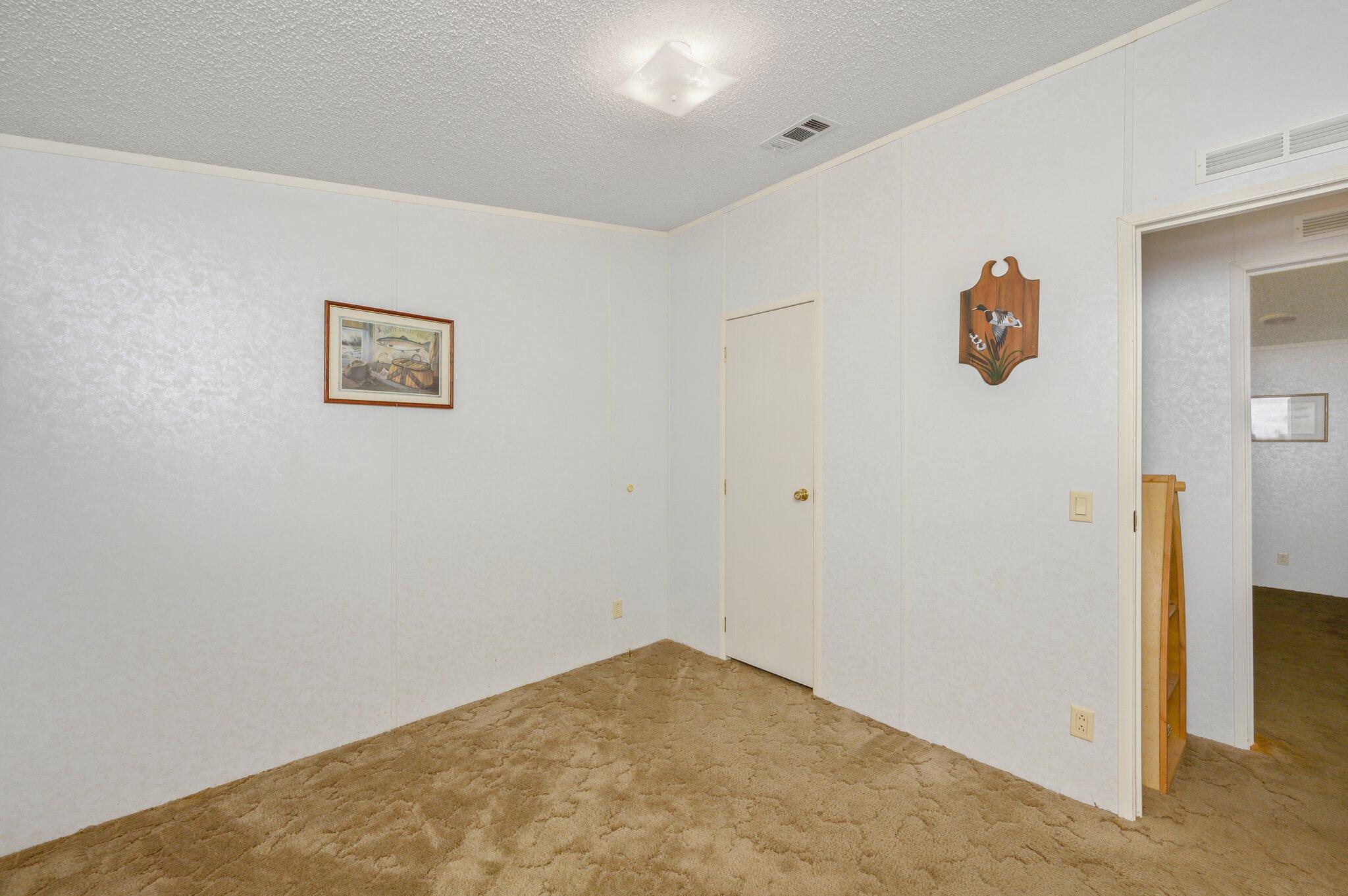 679 Squirrel Road DeFuniak Springs, FL 32433 - Photo 35 of 57 a view of a refrigerator in a room