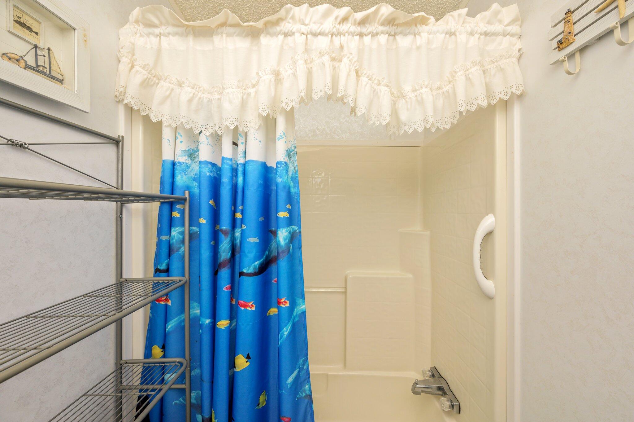 679 Squirrel Road DeFuniak Springs, FL 32433 - Photo 40 of 57 a view of a bathroom with tub and shower