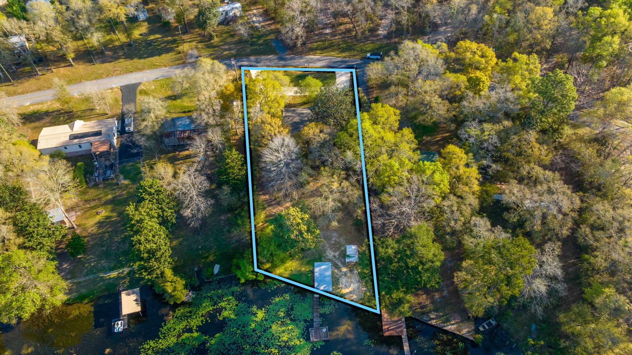 679 Squirrel Road DeFuniak Springs, FL 32433 - Photo 50 of 57 a view of a yard from a balcony