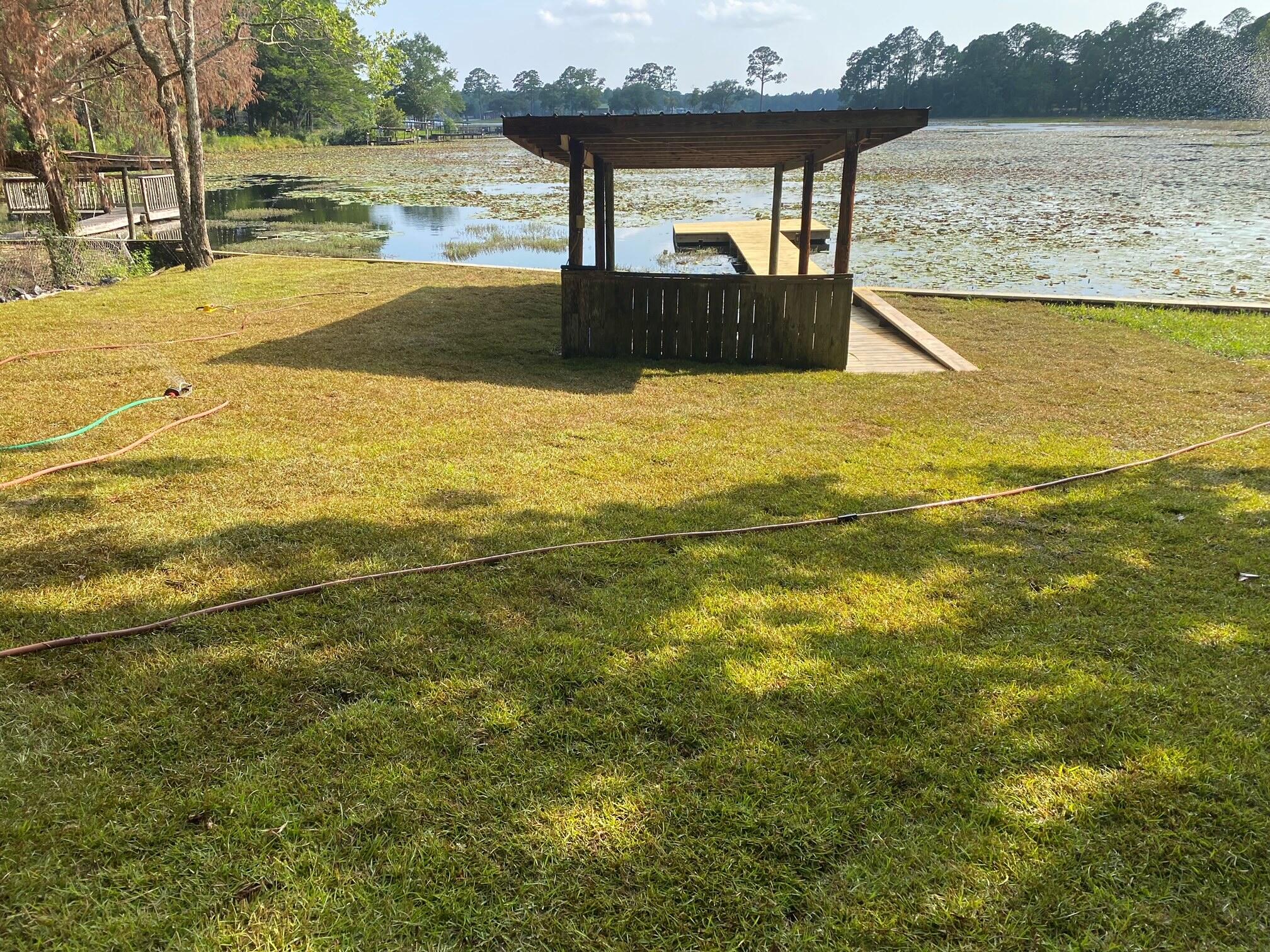 679 Squirrel Road DeFuniak Springs, FL 32433 - Photo 5 of 57 a view of a swimming pool with an ocean view