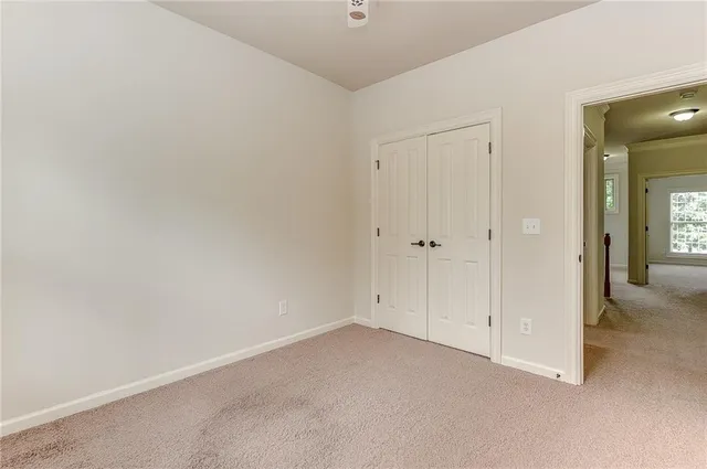 wooden floor and closet in a room