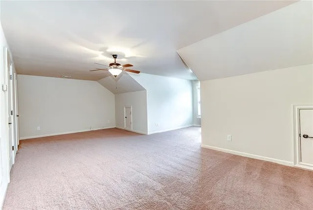 a view of a livingroom with a ceiling fan
