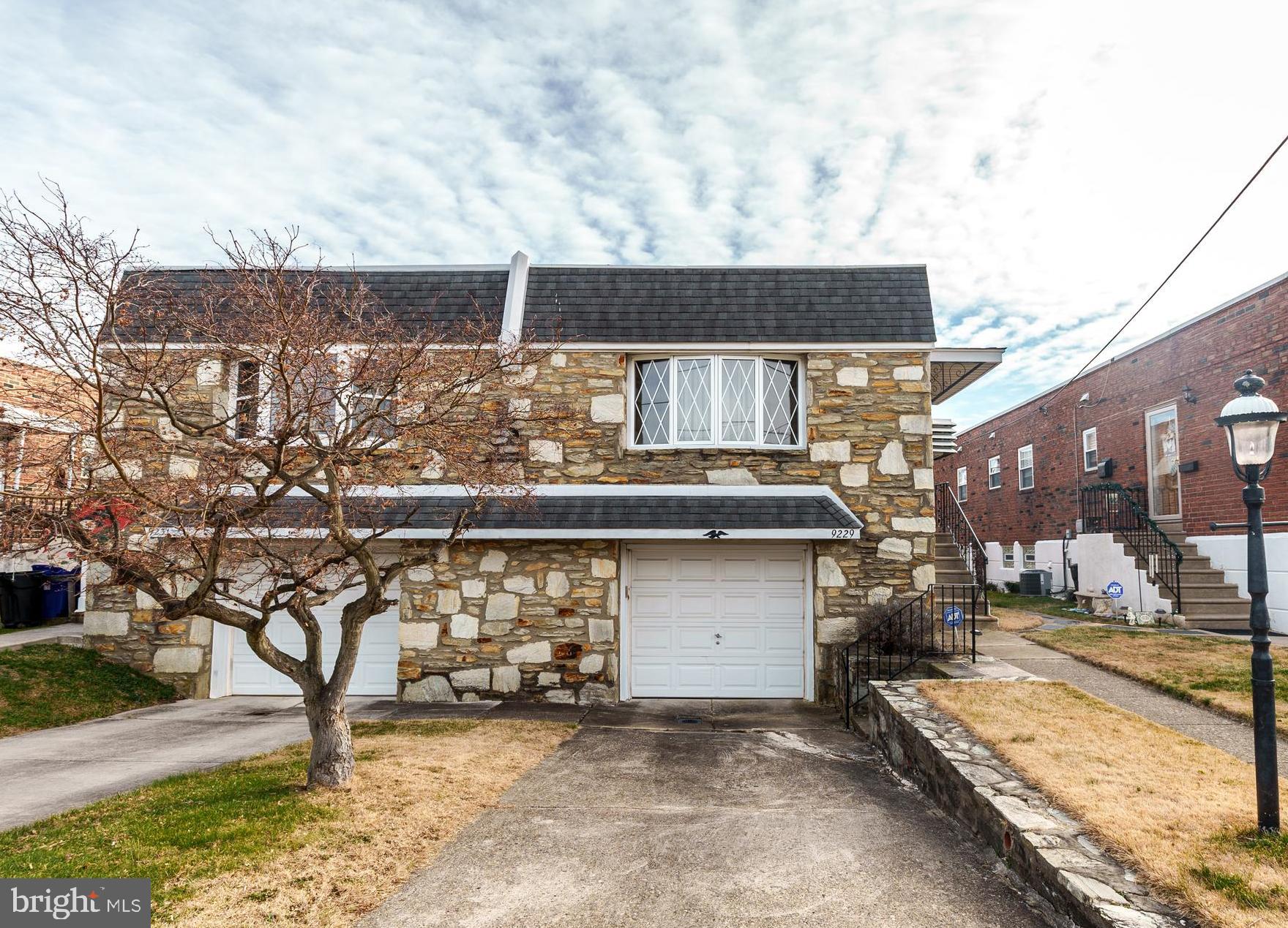 a view of a chairs and table in the patio