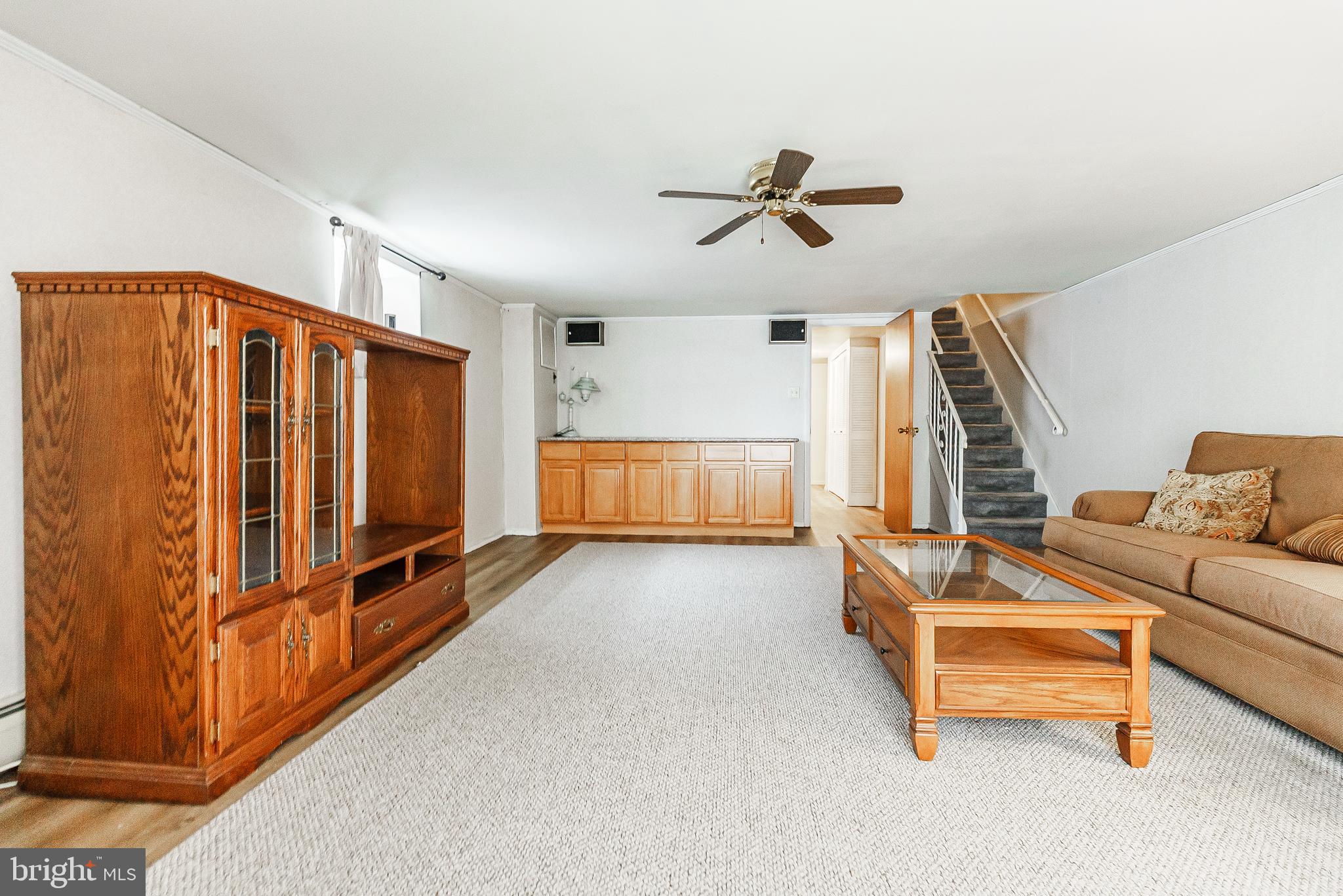 9229 Cottage Street Philadelphia, PA 19114 - Photo 11 of 14 a livingroom with furniture and white walls