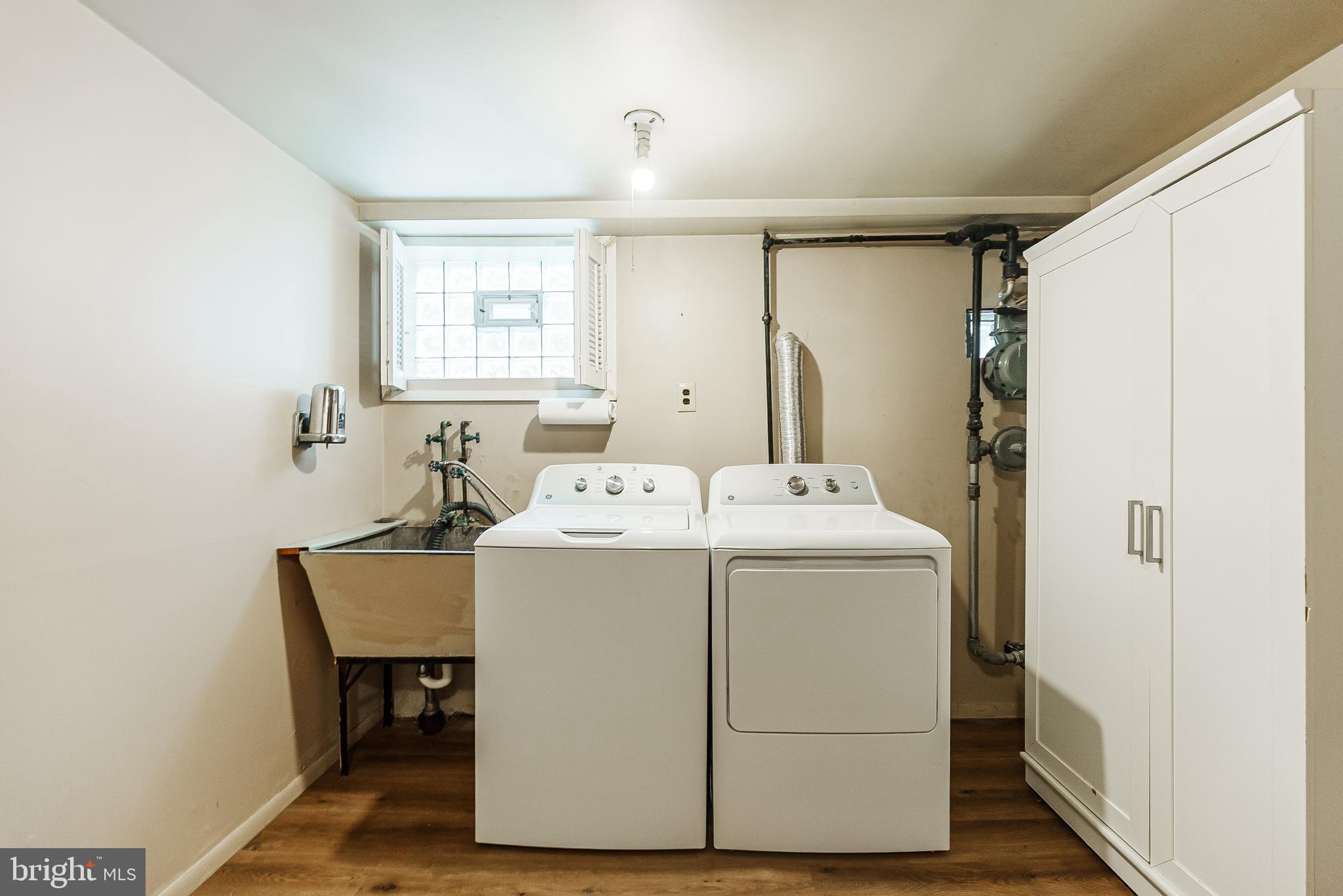 9229 Cottage Street Philadelphia, PA 19114 - Photo 13 of 14 a utility room with dryer and washer