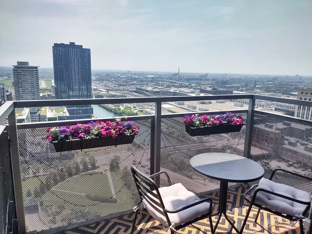 a view of a chairs and table in the terrace