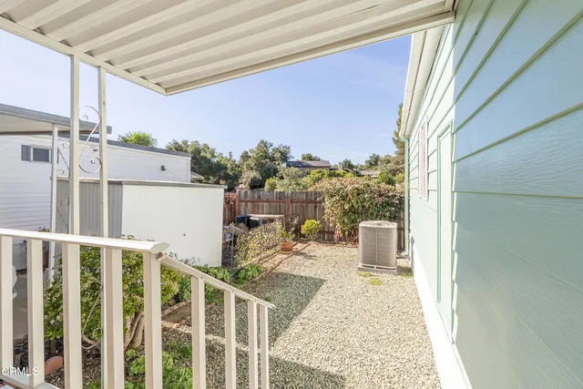 a view of a porch with furniture