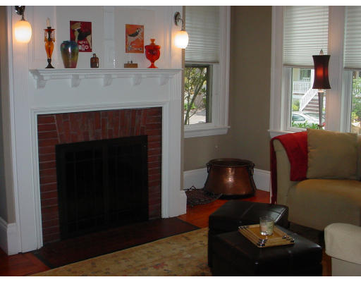 17 Milton Road Brookline, MA 02445 - Photo 2 of 17 a living room with furniture and a fireplace