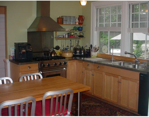 17 Milton Road Brookline, MA 02445 - Photo 5 of 17 a kitchen with a stove a sink and a cabinets