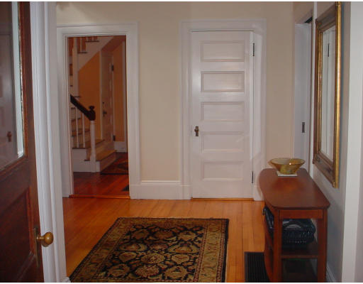 17 Milton Road Brookline, MA 02445 - Photo 6 of 17 a room with wooden floor and a rug