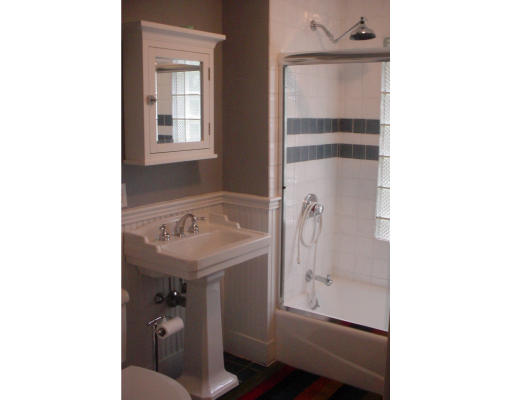 17 Milton Road Brookline, MA 02445 - Photo 9 of 17 a bathroom with a sink and mirror