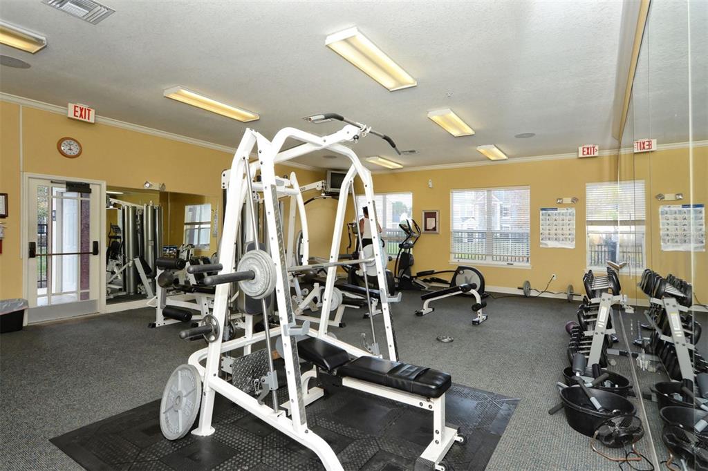 5501 Rosehill Road, Unit 105 Sarasota, FL 34233 - Photo 42 of 45 a view of a room with gym equipment