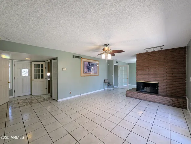 a kitchen with stainless steel appliances granite countertop a stove and a microwave
