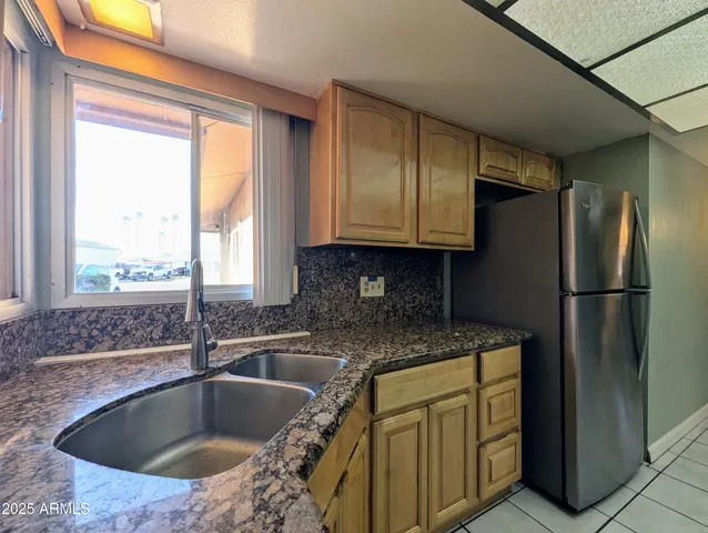 a view of a bathroom from a hallway