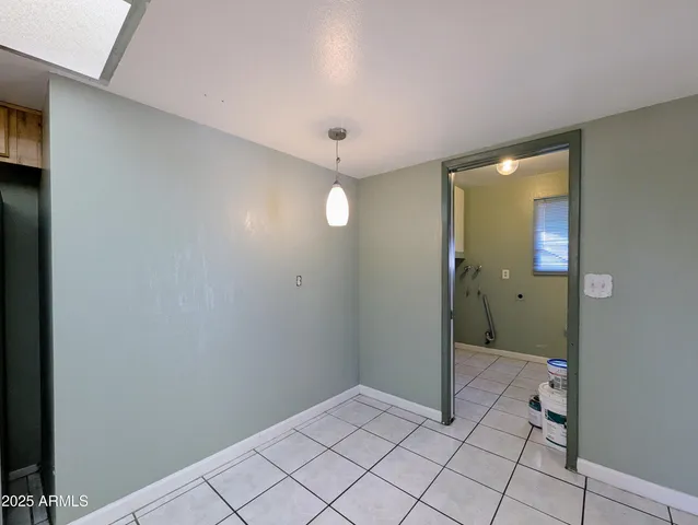 a bathroom with a sink toilet and mirror
