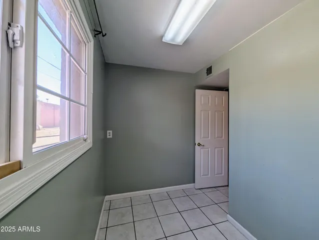 a view of a house with a patio