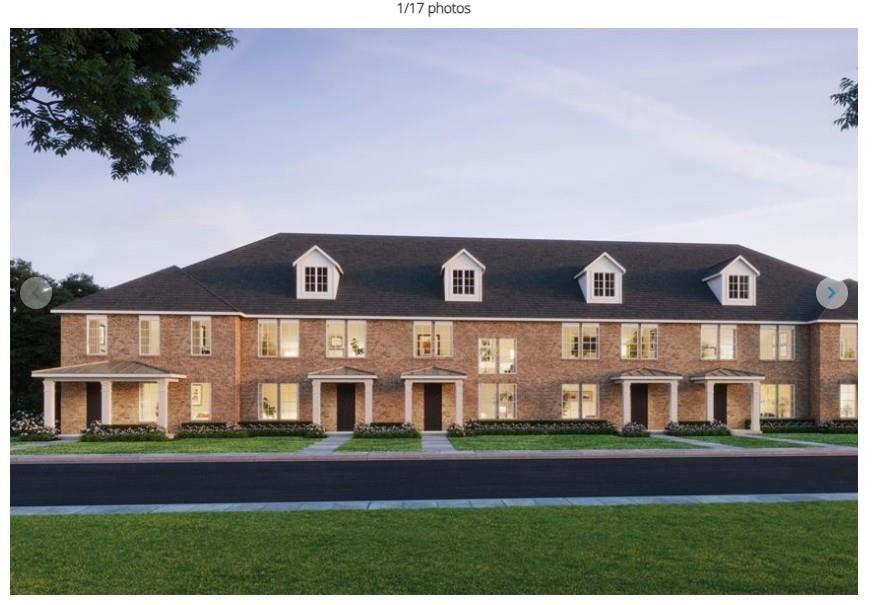 front view of building with a yard