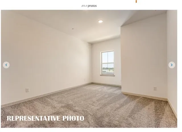 a spacious bathroom with a granite countertop sink and a mirror