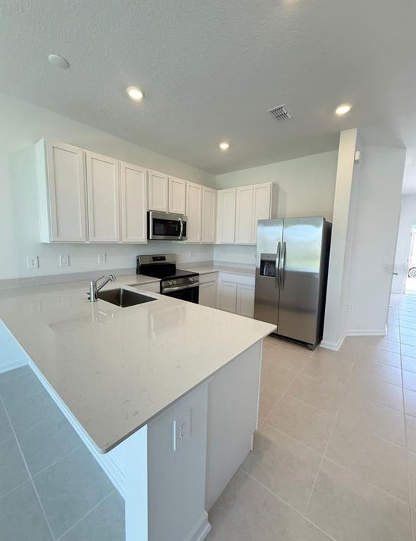 2633 Skyline Loop Kissimmee, FL 34758 - Photo 3 of 16