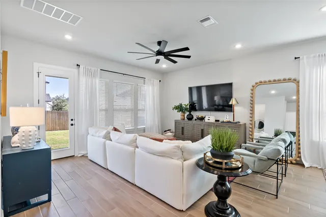 a kitchen with a table and chairs