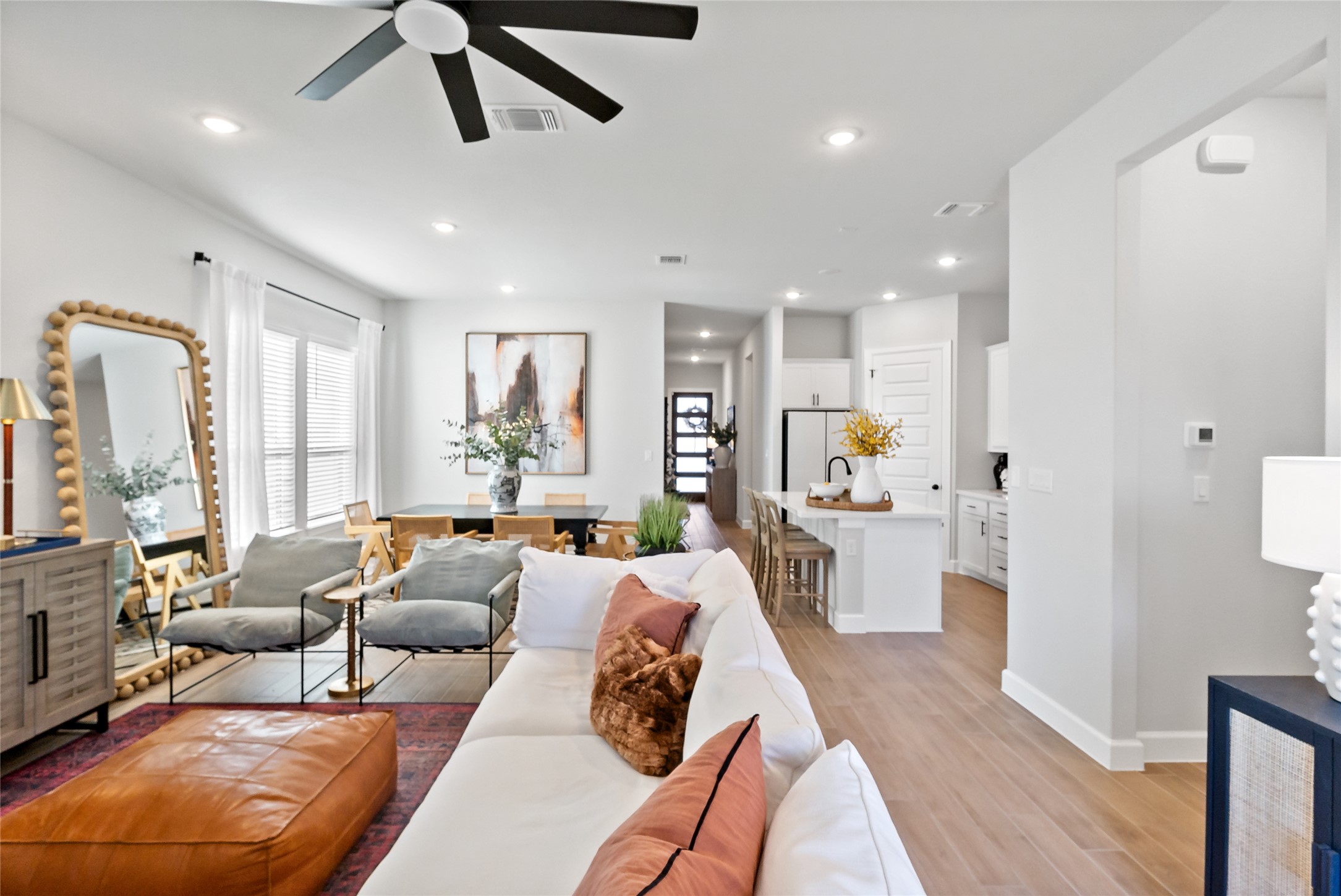 163 Cotton Tree Terrace Dripping Springs, TX 78620 - Photo 18 of 30 a living room with furniture and a large window