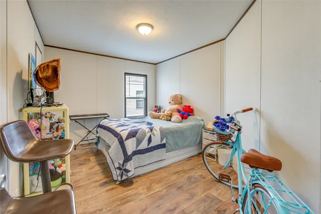 a bedroom with furniture and a bed