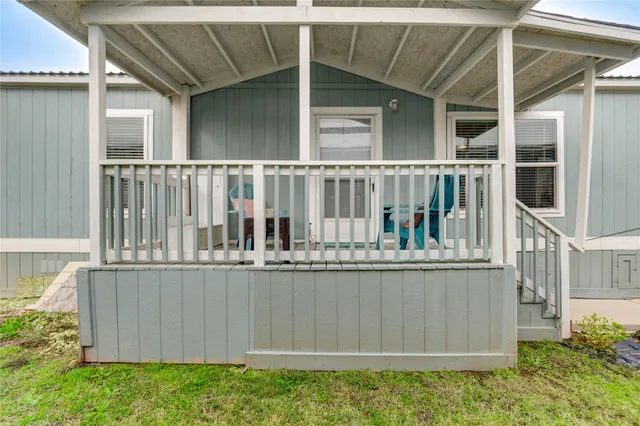 front view of a house with a balcony