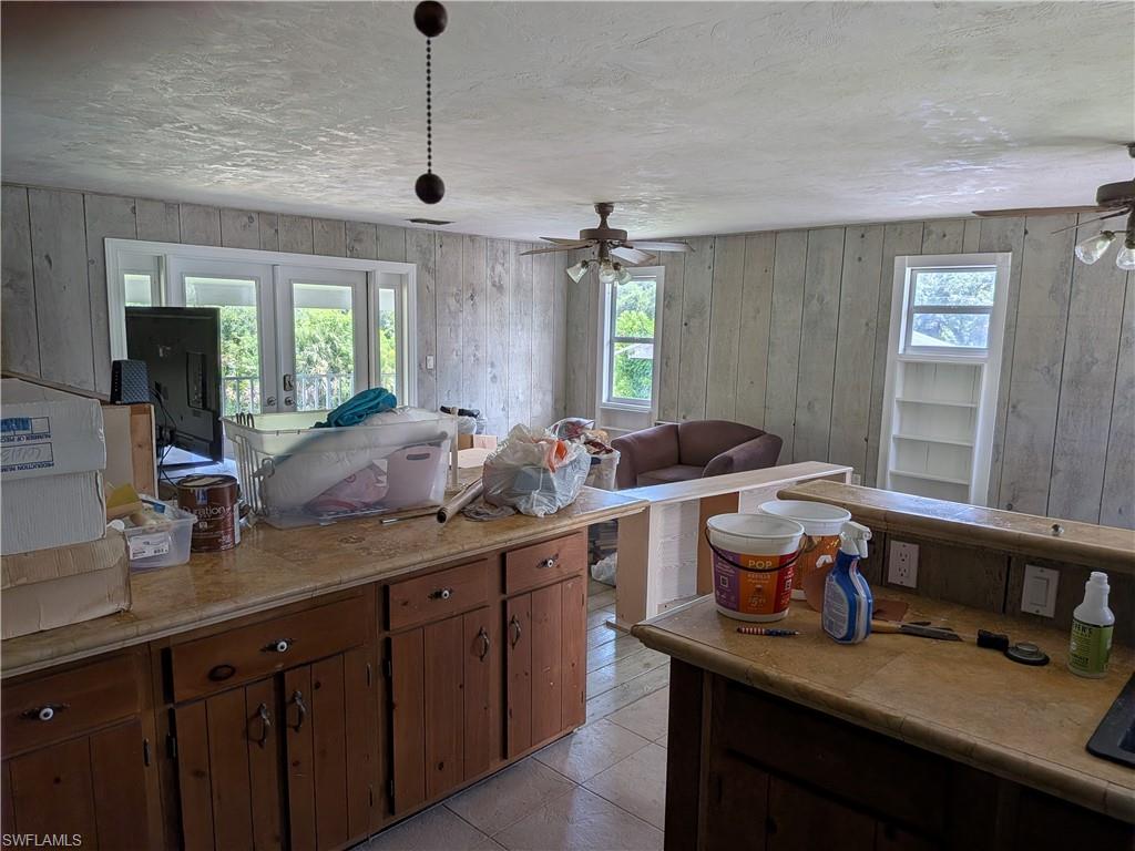 17191 Frank Road Alva, FL 33920 - Photo 23 of 27 a view of a kitchen sink and natural light