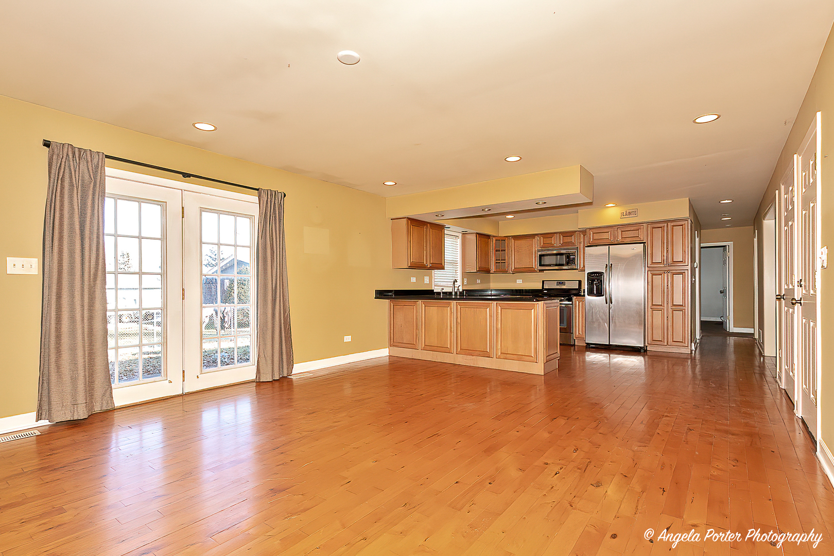 110 Bay Road McHenry, IL 60051 - Photo 11 of 28 a view of kitchen with furniture and wooden floor