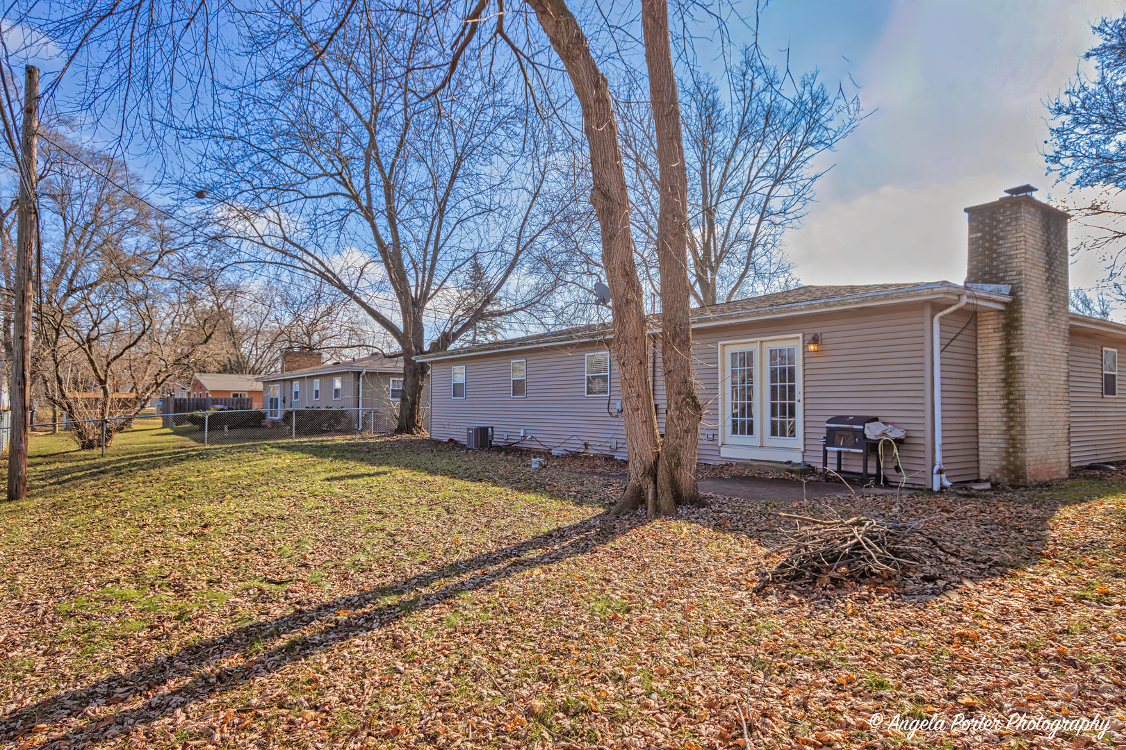 110 Bay Road McHenry, IL 60051 - Photo 25 of 28 a view of a yard with a house and a tree