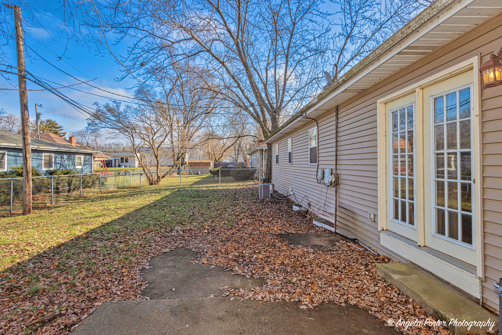 110 Bay Road McHenry, IL 60051 - Photo 26 of 28 a view of a yard with a house and a large tree